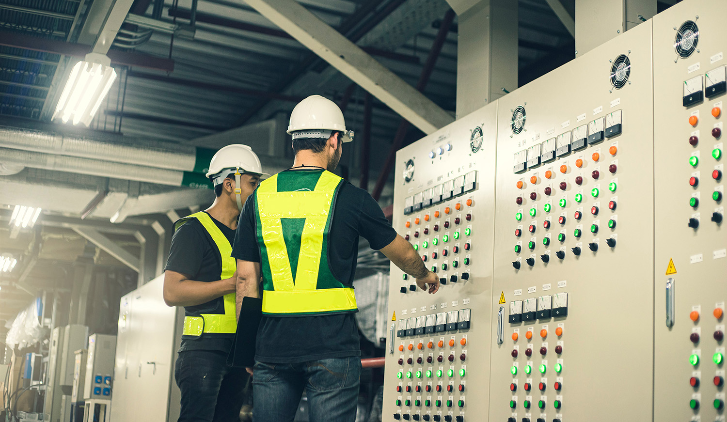 Engineers reviewing equipment.