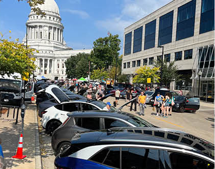 electric vehicles at an event in downtown Madison
