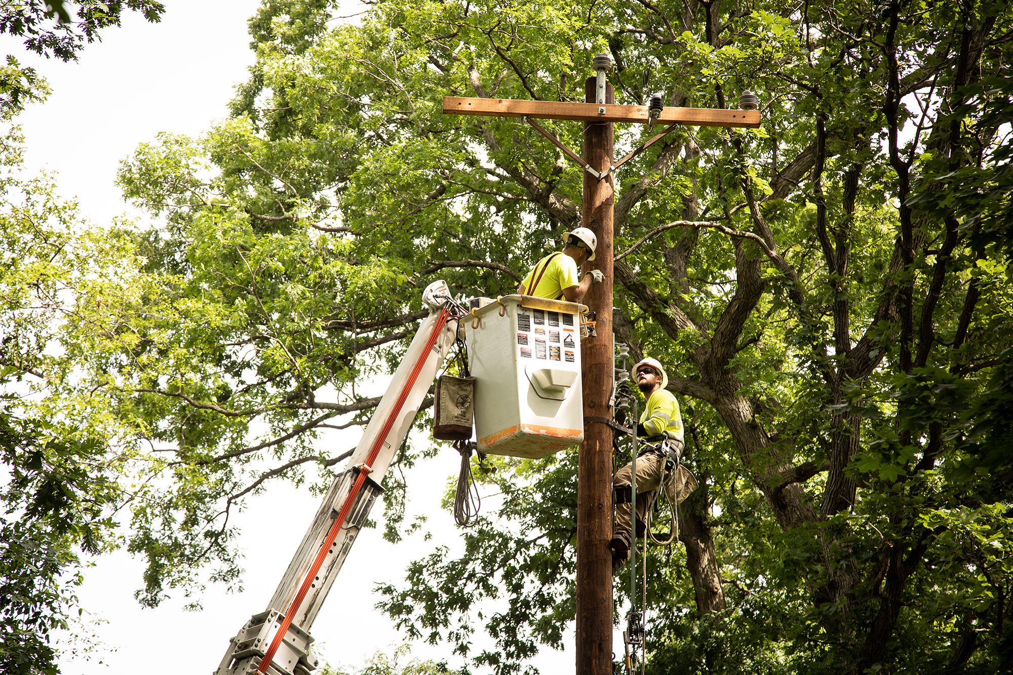 MGE crews repair an electric line after a summer storm.